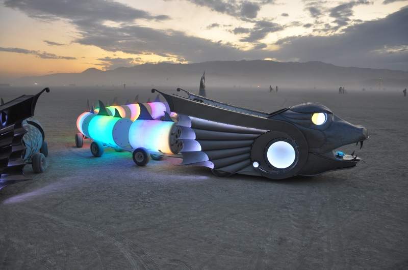 Illustration for article titled And now, two 50-foot-long cars shaped like mythological serpents